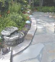 A Beautiful Garden Walkway made of Paving Stones