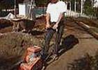 Using a plate compactor