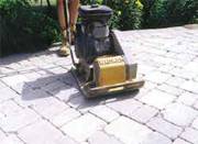 Using a plate compactor