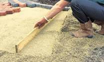 Preparing the sand bed