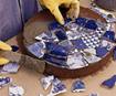 Arranging ceramic pieces on the mortar