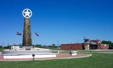 A photograph of the Texas Prison Museum and monument