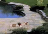 Beautiful swimming pool area enhanced with Bluestone Pavers